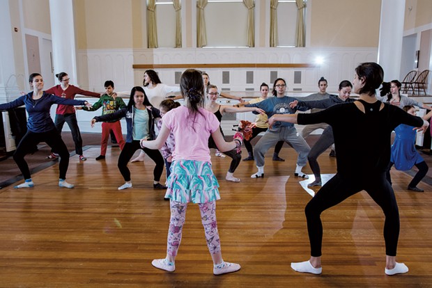 UVM and Project Prima students practice ballet positions during practice in Ira Allen Chapel - SAM SIMON