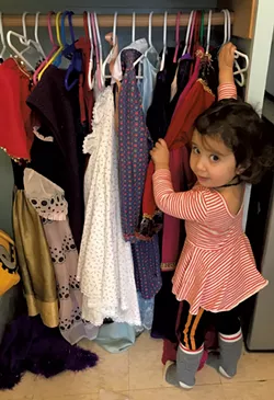 The space includes a collection of dress-up clothes - BRETT STANCIU