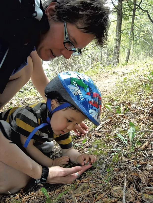 Heather and Jesse look for bugs at Rock Point in Burlington - HEATHER FITZGERALD