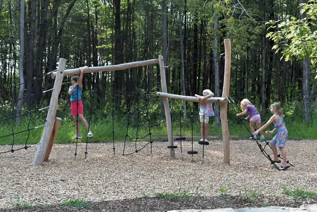 Kids play on the obstacle course during City Center Park's 2018 grand opening - COURTESY OF SOUTH BURLINGTON RECREATION & PARKS