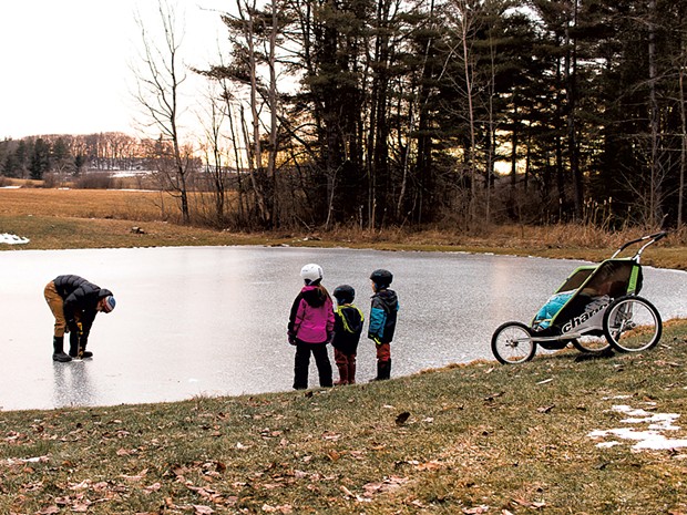 Measuring the backyard pond's ice - KATE FARRELL