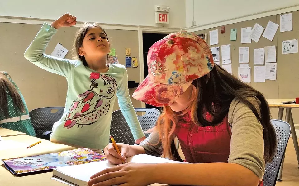 Ava Kathleen Albrecht poses for Isabella Hall during the opening exercise - SARAH YAHM
