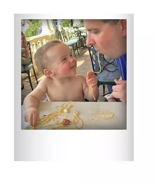 Joe Victory and son, Jackson, slurping pasta at Disney World in March, 2015. Submitted by Sara Victory, Winooski