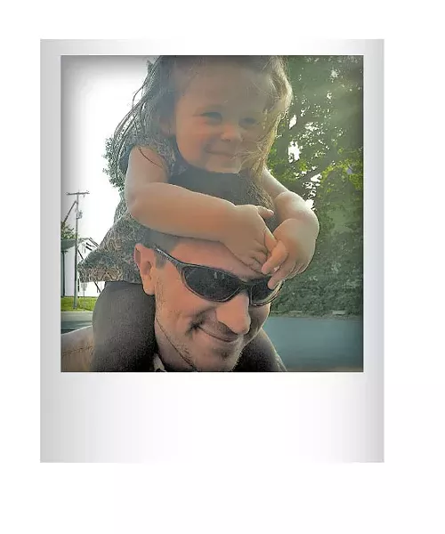 Chris George giving Posie a ride at the Old Brick Store in Charlotte last June. Submitted by Niki George, North Ferrisburgh
