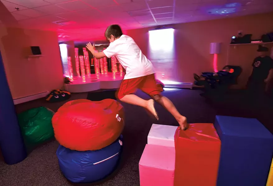 Beanbags and soft blocks in the Imagination Station - JEB WALLACE-BRODEUR