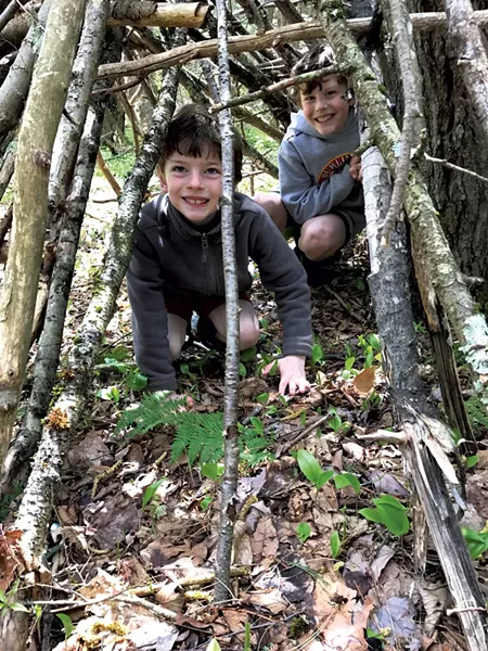 Felix and Leo explore a tree-branch structure - COURTESY OF BENJAMIN ROESCH