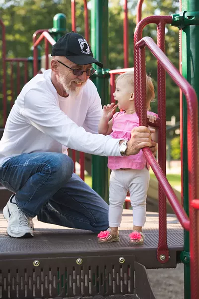 Charles Zanauskas, 66, with daughter Charlotte, 1 - SAM SIMON