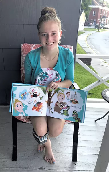Jamie Heath with her book - BRETT STANCIU