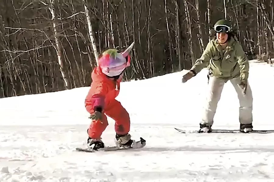 Jess Wisloski snowboards with her daughter at Middlebury Snow Bowl - COURTESY OF JESS WISLOSKI