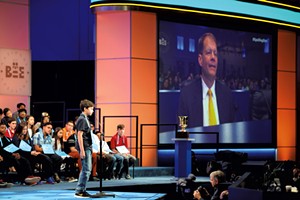 Dr. Jacques Bailly on the big screen at the 2018 Scripps National Spelling Bee