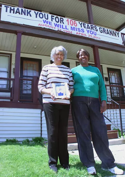 Dorothy Ziegler (left) and Betty Seay with a photo of Mama. - PHOTO: DETROITBLOGGER JOHN