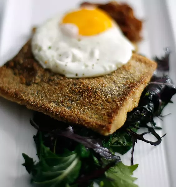 Fox River Breakfast: Sauteed rainbow trout, pork confit hash, and a sunny-side-up egg. - ROB WIDDIS