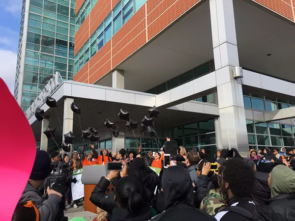 Students release 17 black balloons in honor of the 17 killed in the Parkland, Fla. school shooting. - PHOTOS BY MIRIAM MARINI.