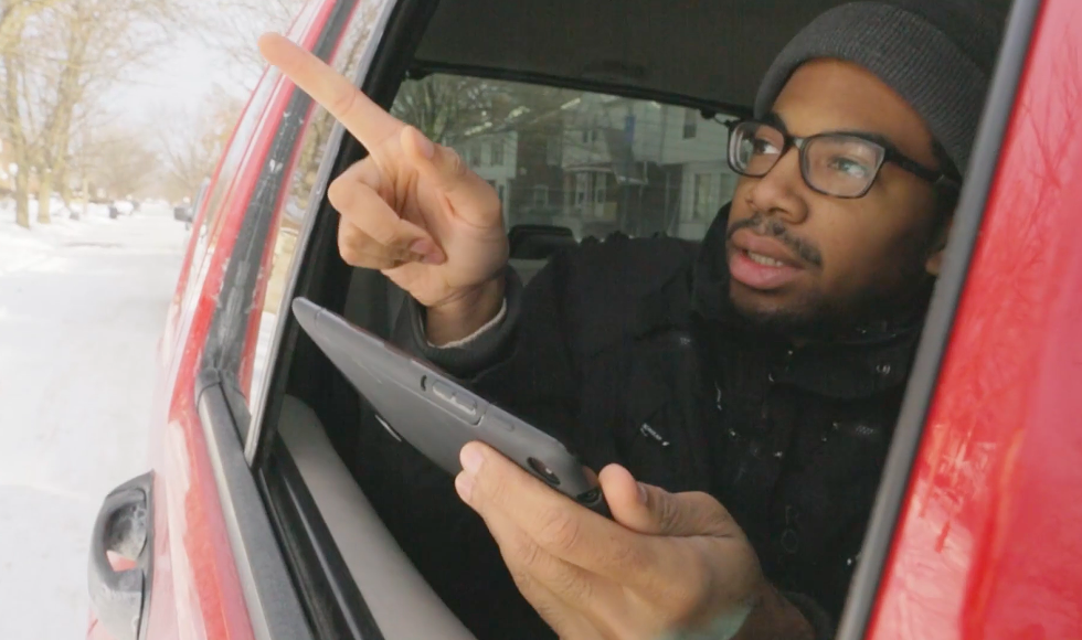 A Detroit resident tracks housing conditions as part of a citywide property survey in 2014. - SCREENGRAB, BLIGHT REMOVAL TASK FORCE VIDEO