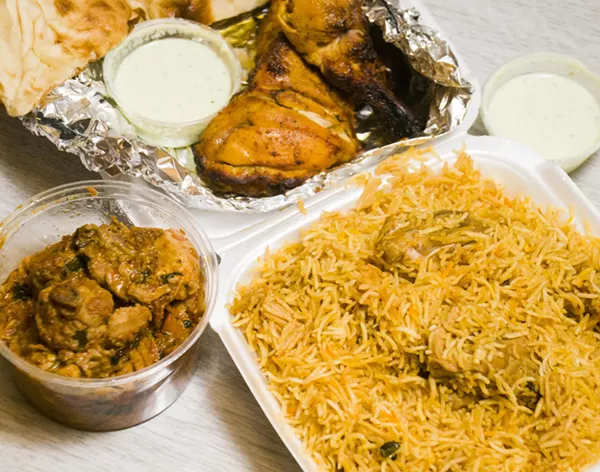 ( Clockwise from top) Tandoori chicken, biryani, and chicken karahi. - TOM PERKINS