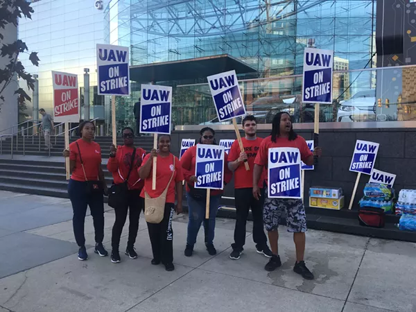 Workers on strike outside of GM's Detroit headquarters. - LEE DEVITO