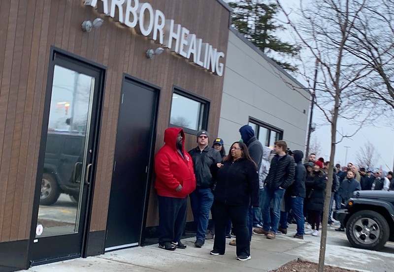 People lined up to buy recreational cannabis at Ann Arbor Healing, one of the first stores to be granted a license to sell. - COURTESY OF ANN ARBOR HEALING