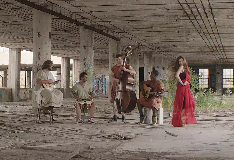 Corbin Bleu as Ovid with musicians in Ovid and the Art of Love. - ZERO MEDIA