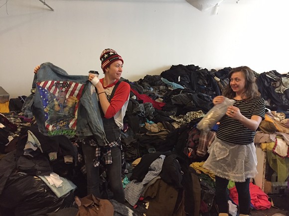 Russell tenant Kory Trinks begins the process of packing up thousands of pounds of vintage wares. - VIOLET IKONOMOVA