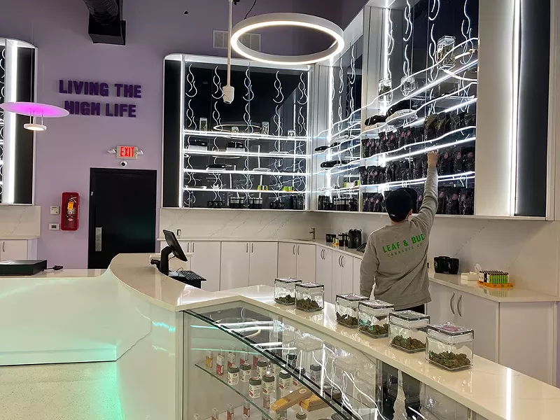 A growing industry: Leaf and Bud’s neon-accented sales floor. The new dispensary claims to be Detroit’s largest. - COURTESY PHOTO