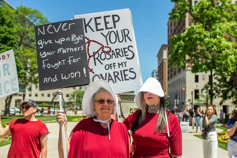 A Handmaid’s Tale-themed pro-choice rally in Lansing. - RACHEL GOODHEW / SHUTTERSTOCK.COM