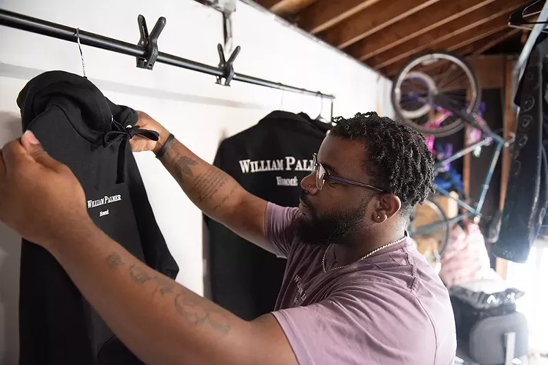 Quandell Wright in his Dearborn garage/fashion studio. - KAHN SANTORI DAVISON
