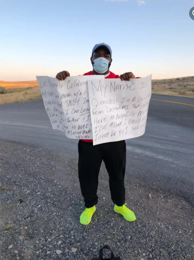 Wright held up signs outset Kanye West's Wyoming home to try to catch his attention. - COURTESY PHOTO