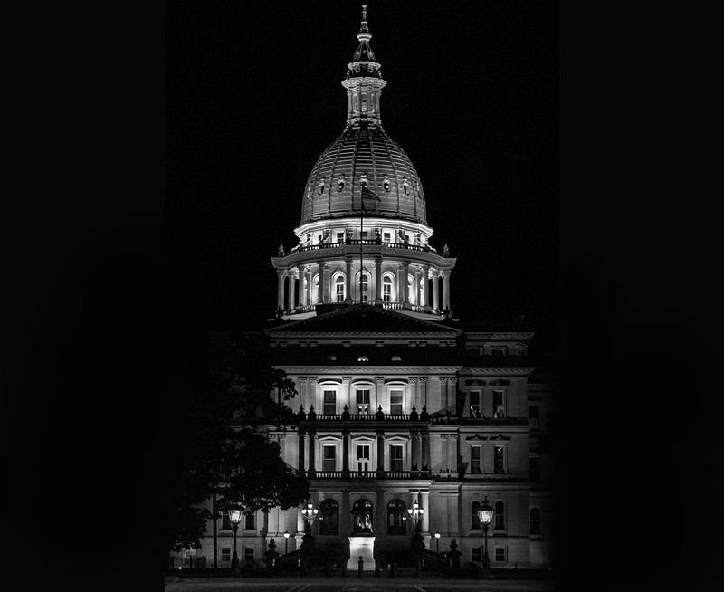 Lansing State Capitol Building in Michigan under cover of darkness.  - MCKEEDIGITAL, SHUTTERSTOCK