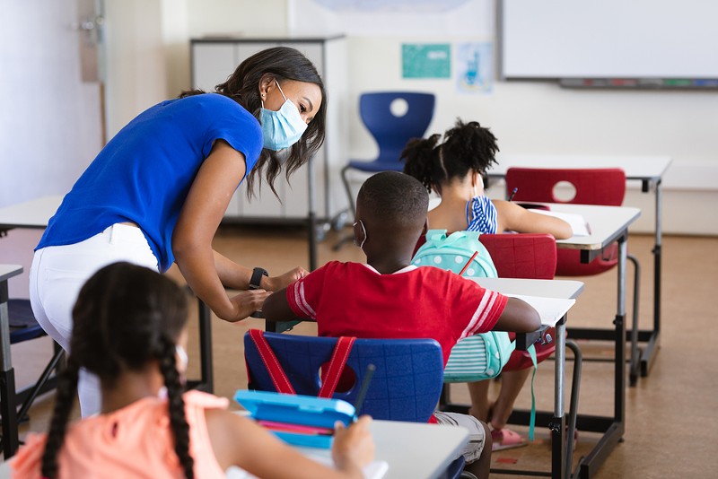 Schools without masks mandates are reporting the largest outbreaks in Michigan. - SHUTTERSTOCK