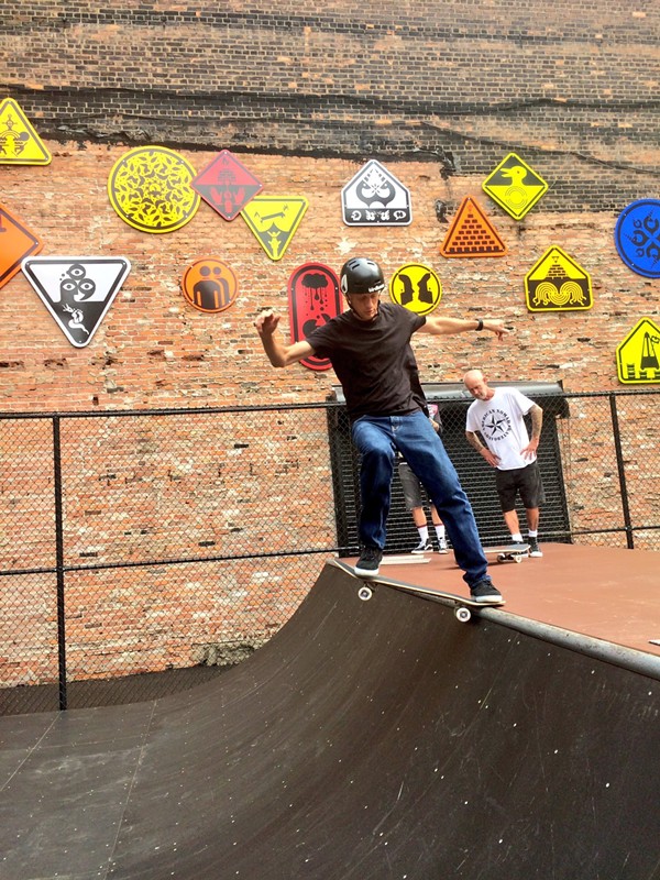 Tony Hawk skateboarding in front of Ryan McGinness artwork at Wayfinding Park, Detroit. - COURTESY PHOTO