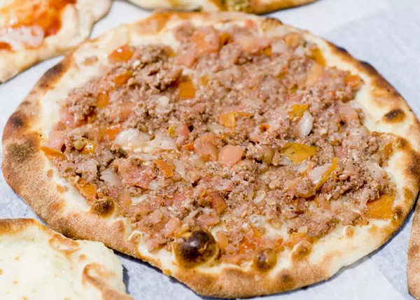 Manoush with "leopard spotting" on the crust. - TOM PERKINS