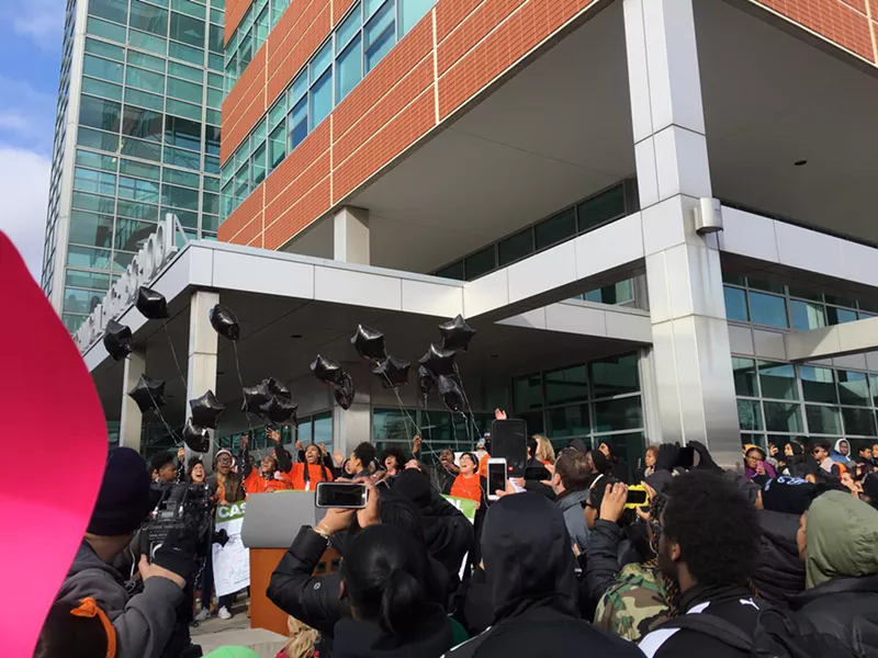 Students release 17 black balloons in honor of the 17 killed in the Parkland, Fla. school shooting. - PHOTOS BY MIRIAM MARINI.