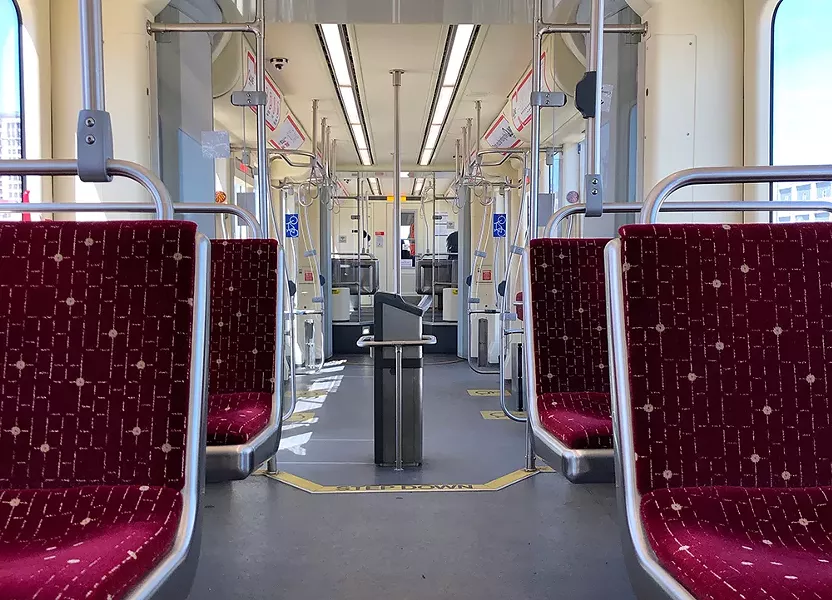 An empty QLine interior on a recent weekday. - STEVE NEAVLING