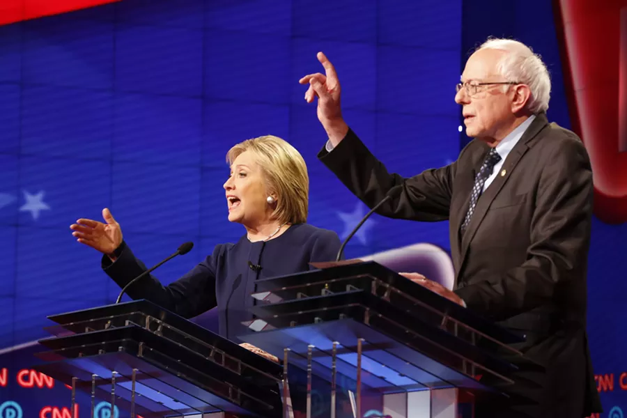 Former Secretary of State Hillary Clinton, left, and Vermont Sen. Bernie Sanders during Sunday's Democratic presidential debate at The Whiting Auditorium in Flint. - PHOTO COURTESY OF CNN