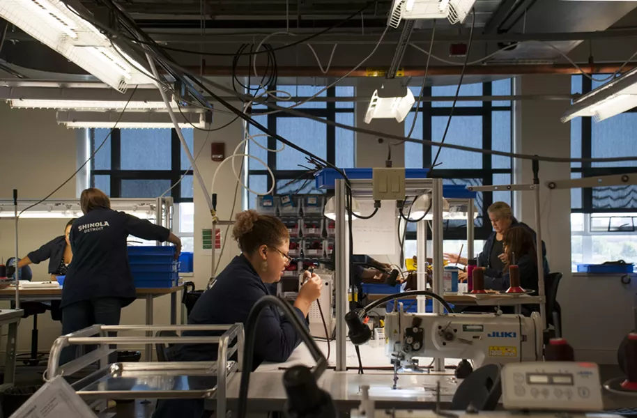 Employees at Shinola's New Center leather factory, located in a former GM design lab. - PHOTO BY TOM PERKINS