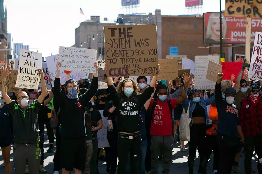 Protesters gathered in Detroit on Sunday for the third straight day of demonstrations. - STEVE NEAVLING