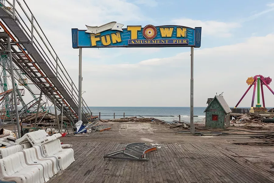 “Pier Entrance, Fun Town Amusements, Destroyed by Hurricane Sandy, Seaside Park, New Jersey, 2013. Elevation Sixteen Feet. N 39.94122 W 74.07093.” - PHOTO BY JOHN GANIS.