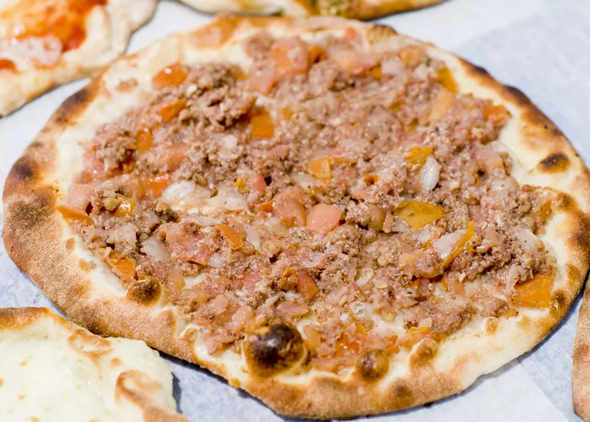 Manoush with "leopard spotting" on the crust. - TOM PERKINS