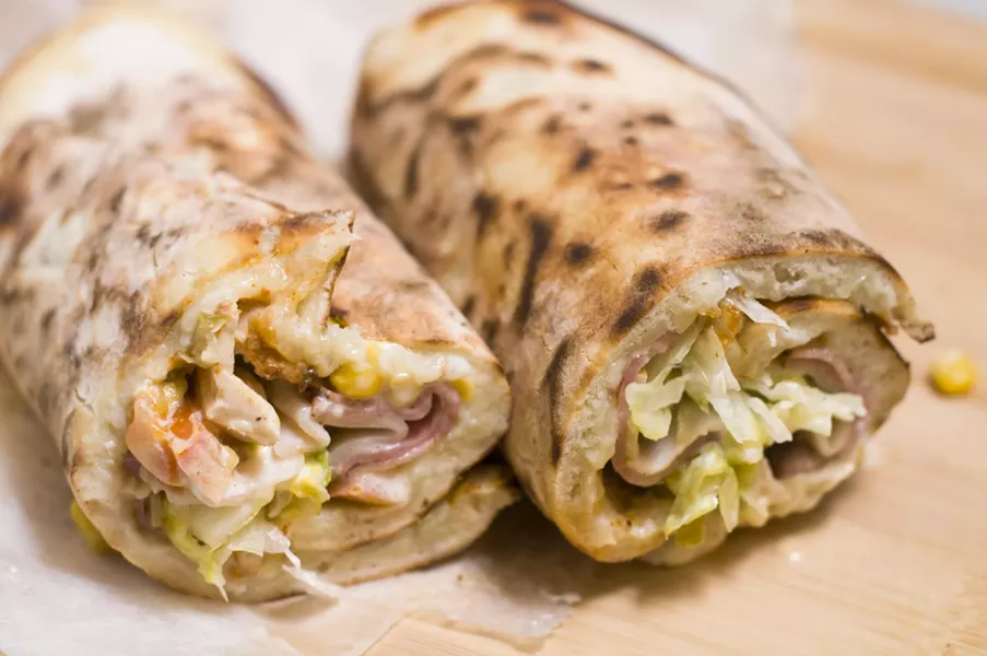 Royal manoush. The "leopard print" char markings you see on the bread are a sign of a quality. - TOM PERKINS