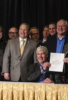 Gov. Rick Snyder signing a bill appropriating $28 million in short-term aid for the people of Flint in January 2016.