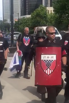 Neo-Nazis march in downtown Detroit to protest Motor City Pride.