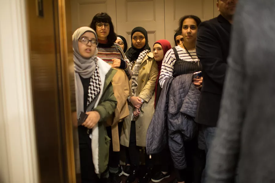 Youth squeeze into an elevator to the sixth floor on their way to Tlaib’s office. - ERIK PAUL HOWARD