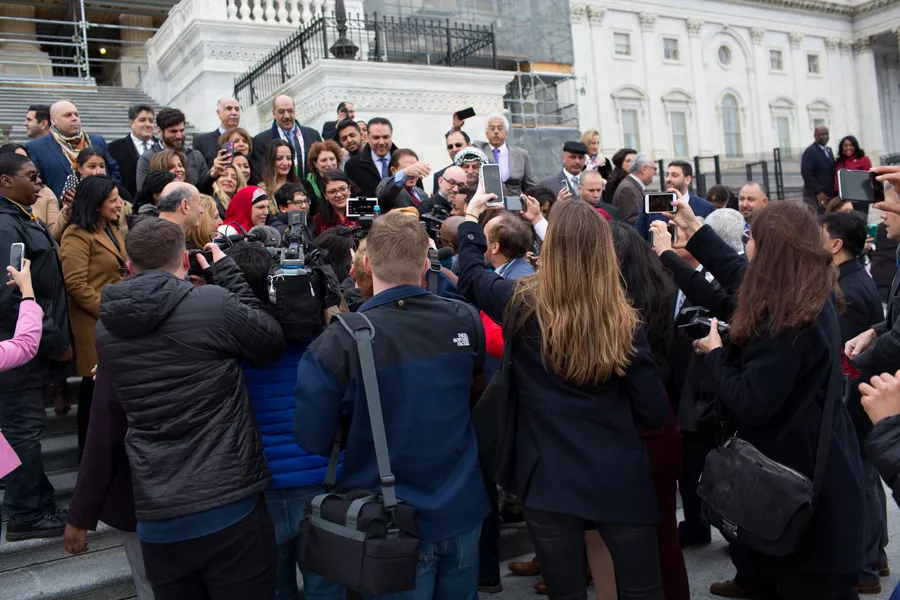 Tlaib heads over with constituents and supporters to the Capitol Building for a group portrait and the swearing-in ceremony. - ERIK PAUL HOWARD