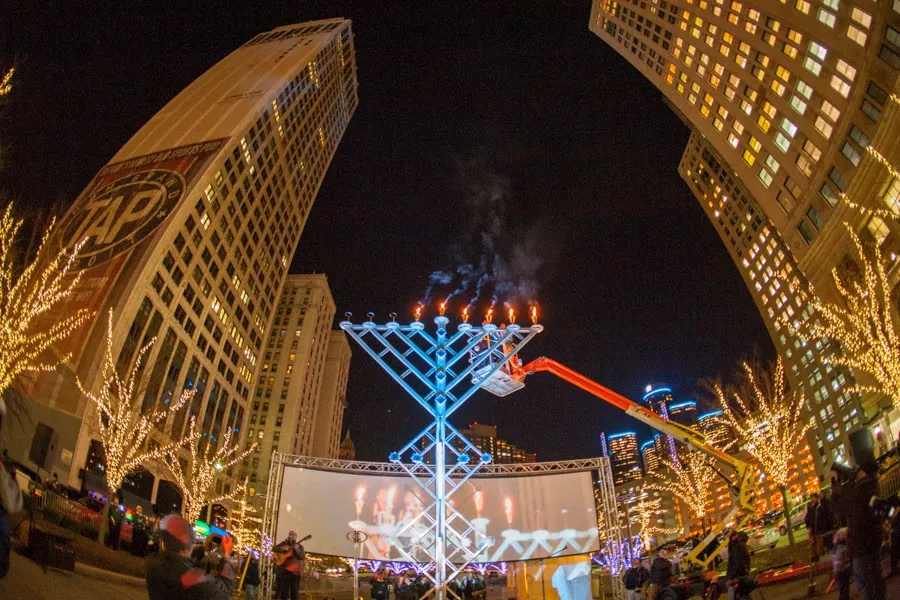 Menorah in the D celebrated a decade of celebrating Hanukkah in downtown Detroit with a large menorah. Downtown Detroit has no large Kwanzaa kinara. - COURTESY OF MENORAH IN THE D
