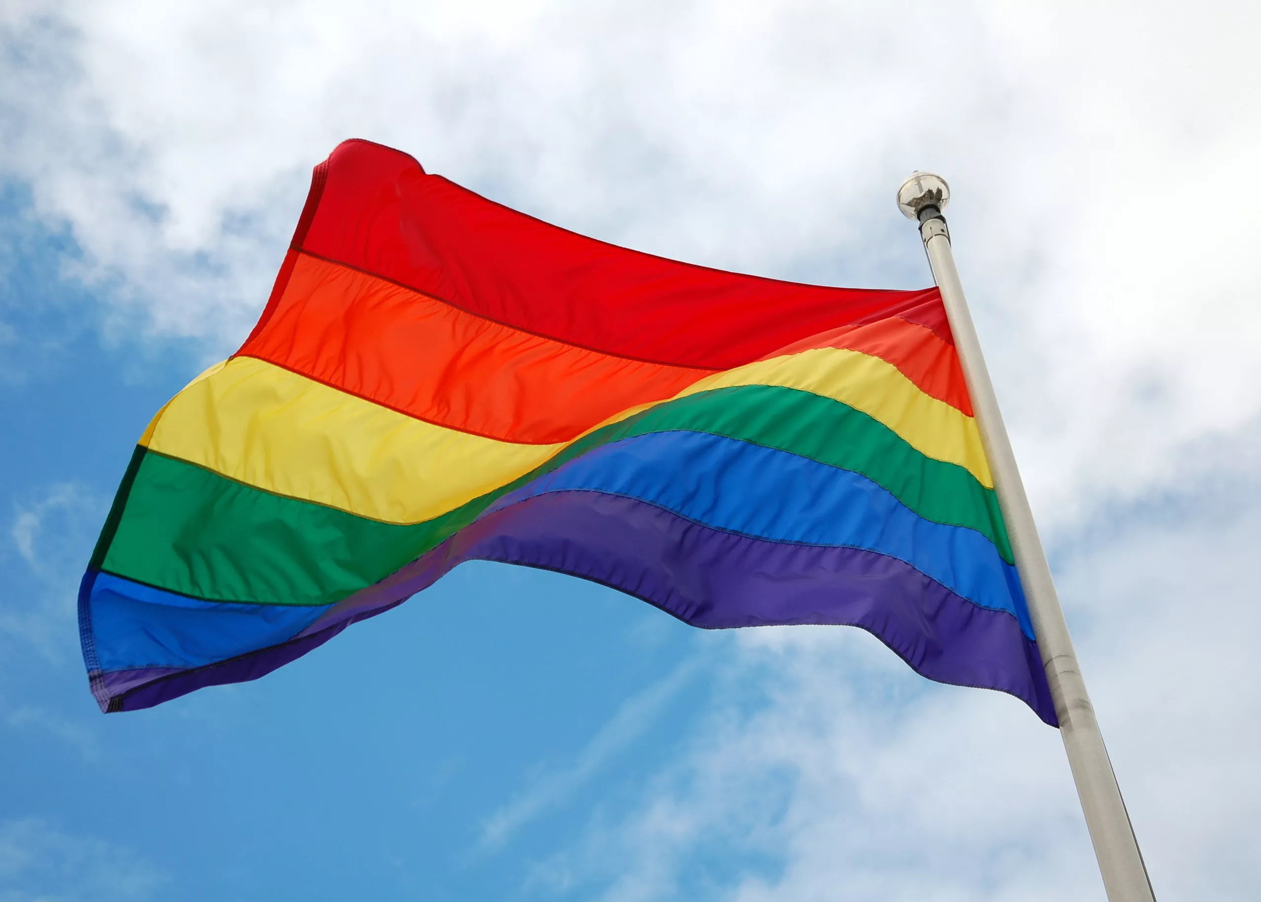 Gay pride flag waving blowing stock footage photo