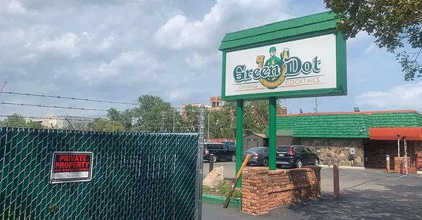 Court orders fence built in Detroit's Green Dot Stables parking lot removed in property dispute with Moroun