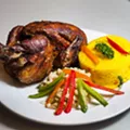 Whole chicken, couscous, and marinated onions. Whole chicken, couscous, and marinated onions.