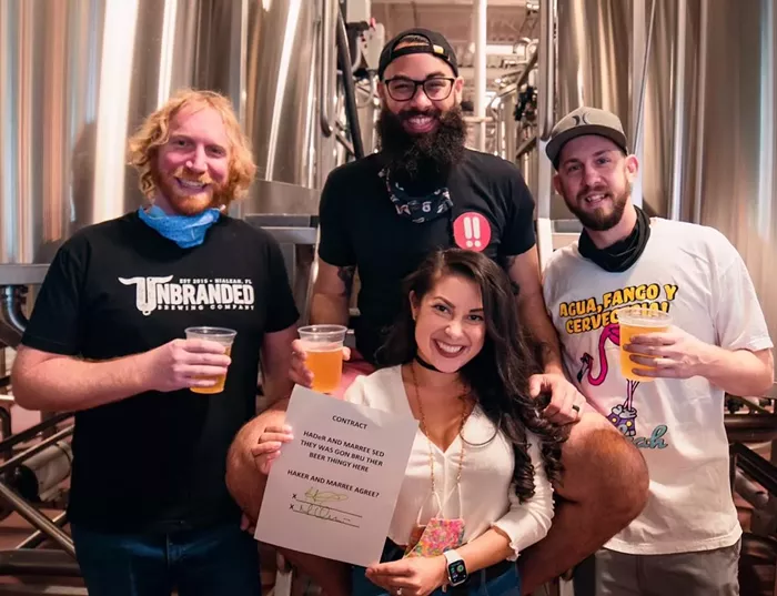 Shōjō Beer Co. cofounders Haidar Hachem (black T-shirt and glasses) and Marilyn Orozco (front and center) alongside Unbranded Brewing's Zach Swanson (left) and Lance Aschliman (right). - PHOTO BY JAVI PEREZ/ COURTESY OF SHŌJŌ BEER CO.