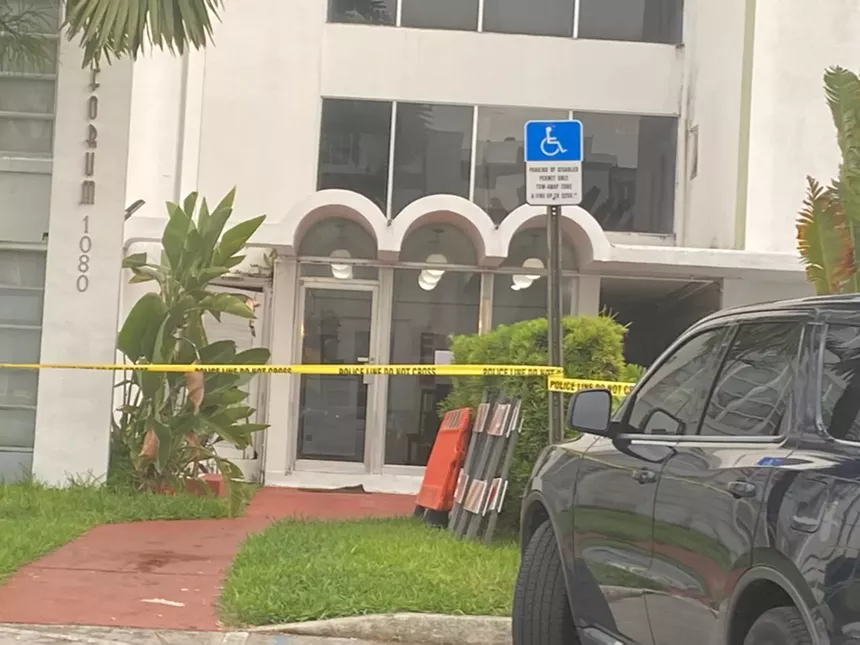 Caution tape keeps residents from entering the 56-year-old building after it was evacuated. - PHOTO BY TERI D'AMICO