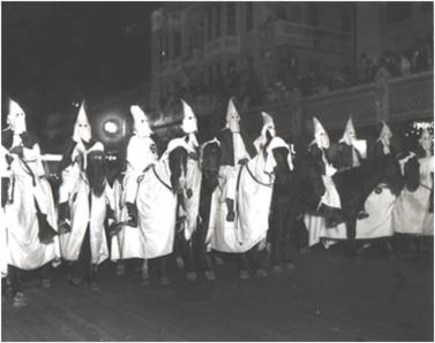 The Ku Klux Klan prepares to ride through Downtown Miami circa the 1940s. - PHOTO COURTESY OF MARVIN DUNN